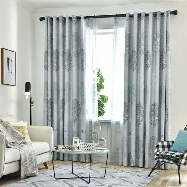 Moderne vitrage met groot bladmotief