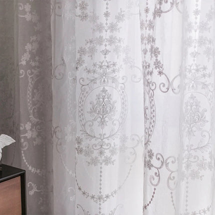 Klassieke vitrage met beige damastpatroon