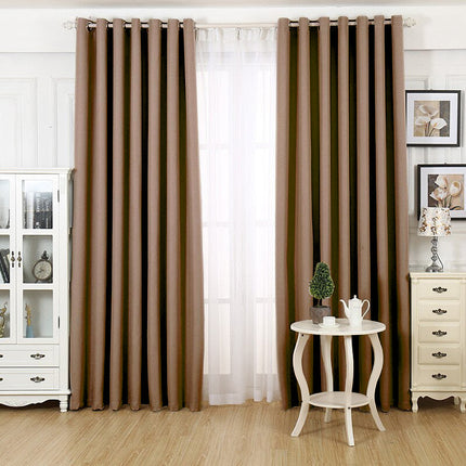 Verduisterend gordijn koffie crème met ringen