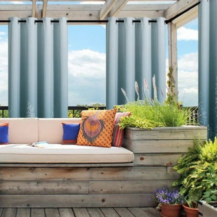 Groen buitengordijn met verloop voor terras.