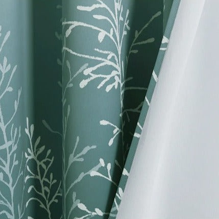 Groen buitengordijn met verloop voor terras.