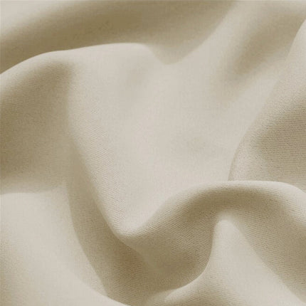 Beige waterdicht buitengordijn voor de serre.