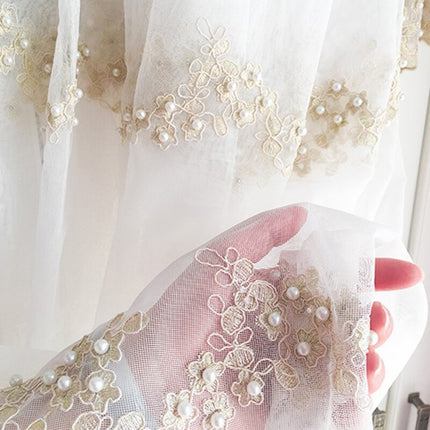 Luxe vitrage met parels en borduurwerk
