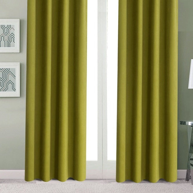 Effen groen gordijn met ringen