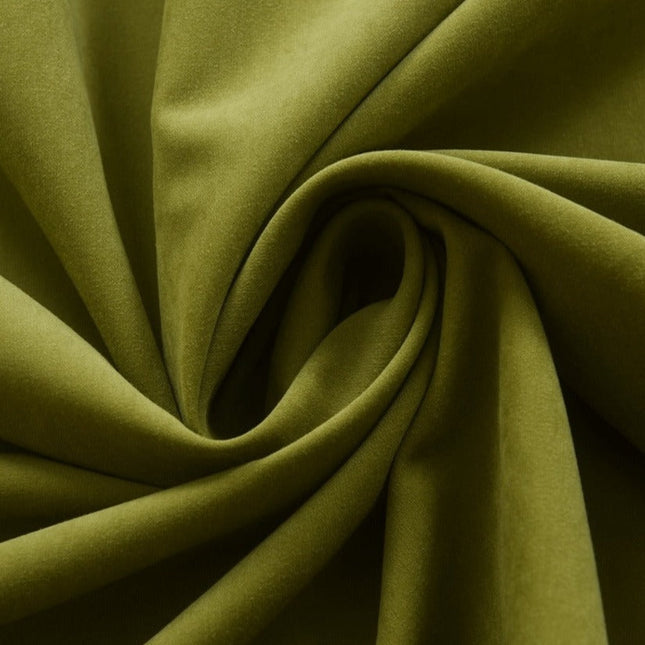 Effen groen gordijn met ringen